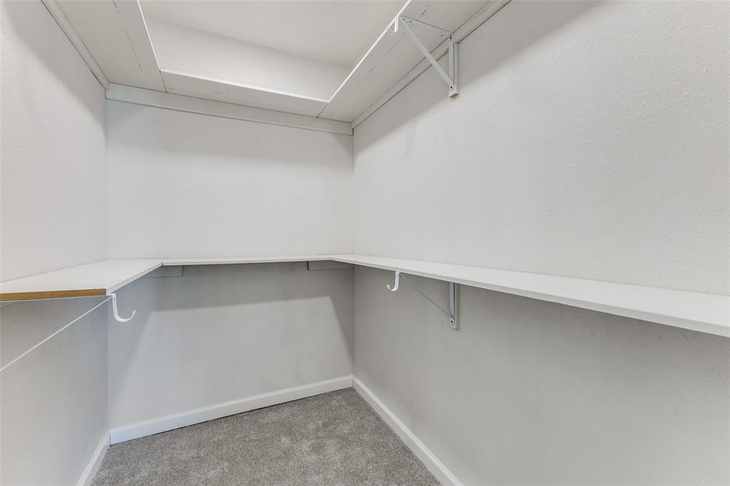 3719 Dutton Drive Dallas, TX 75211 - Photo 21 of 24 a view of an empty walk in closet