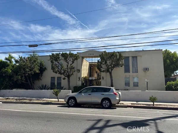a car parked in front of a building