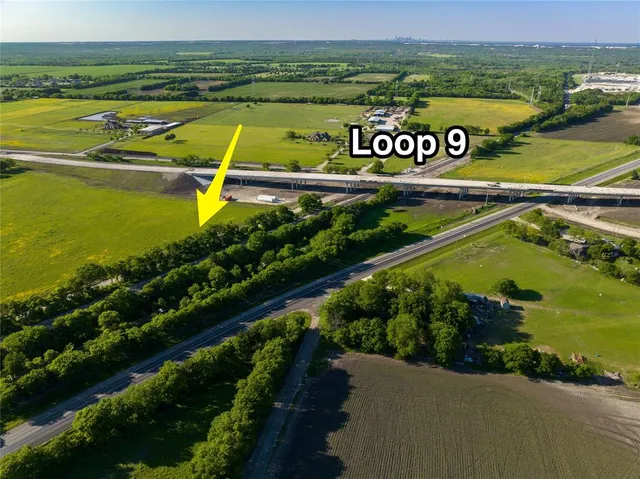 a view of a street with an ocean view