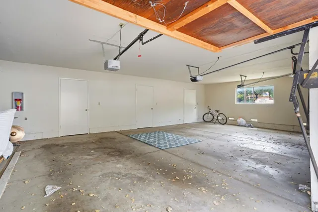 a outdoor living space with furniture and a fireplace