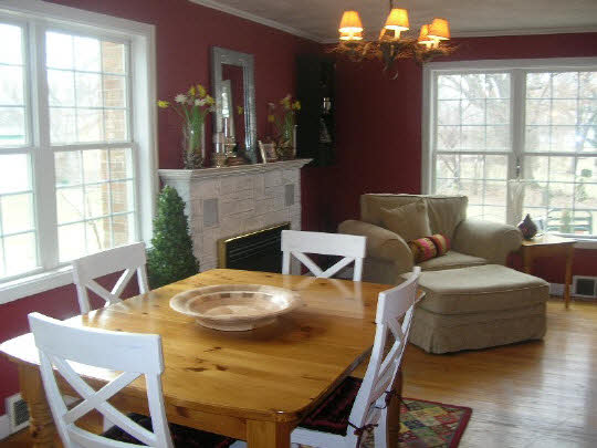 24 Valley Road Beloit, WI 53511 - Photo 6 of 6 a living room with furniture a chandelier and a large window