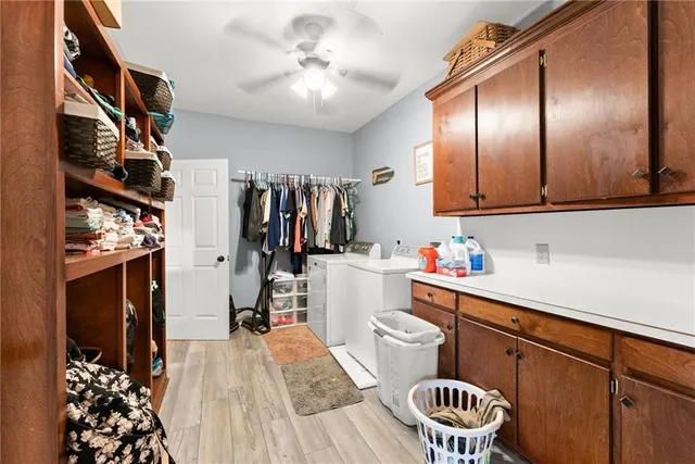 a view of a livingroom with furniture window and wooden floor