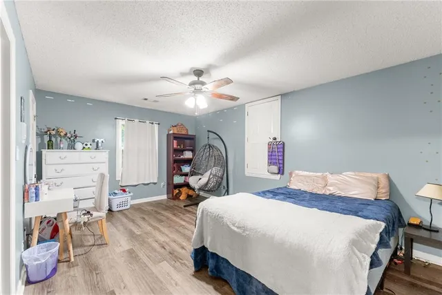 a room with furniture and air hockey table