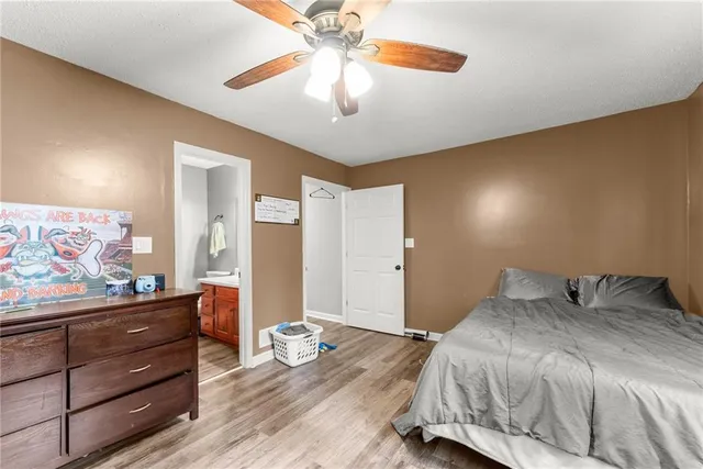 a view of a mountain range with lush green forest