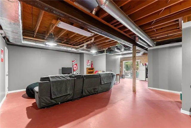 a view of backyard with seating area and green space