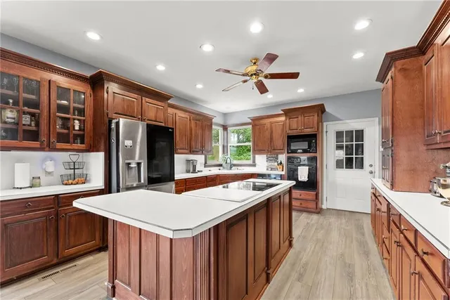 a balcony with couch and outdoor view
