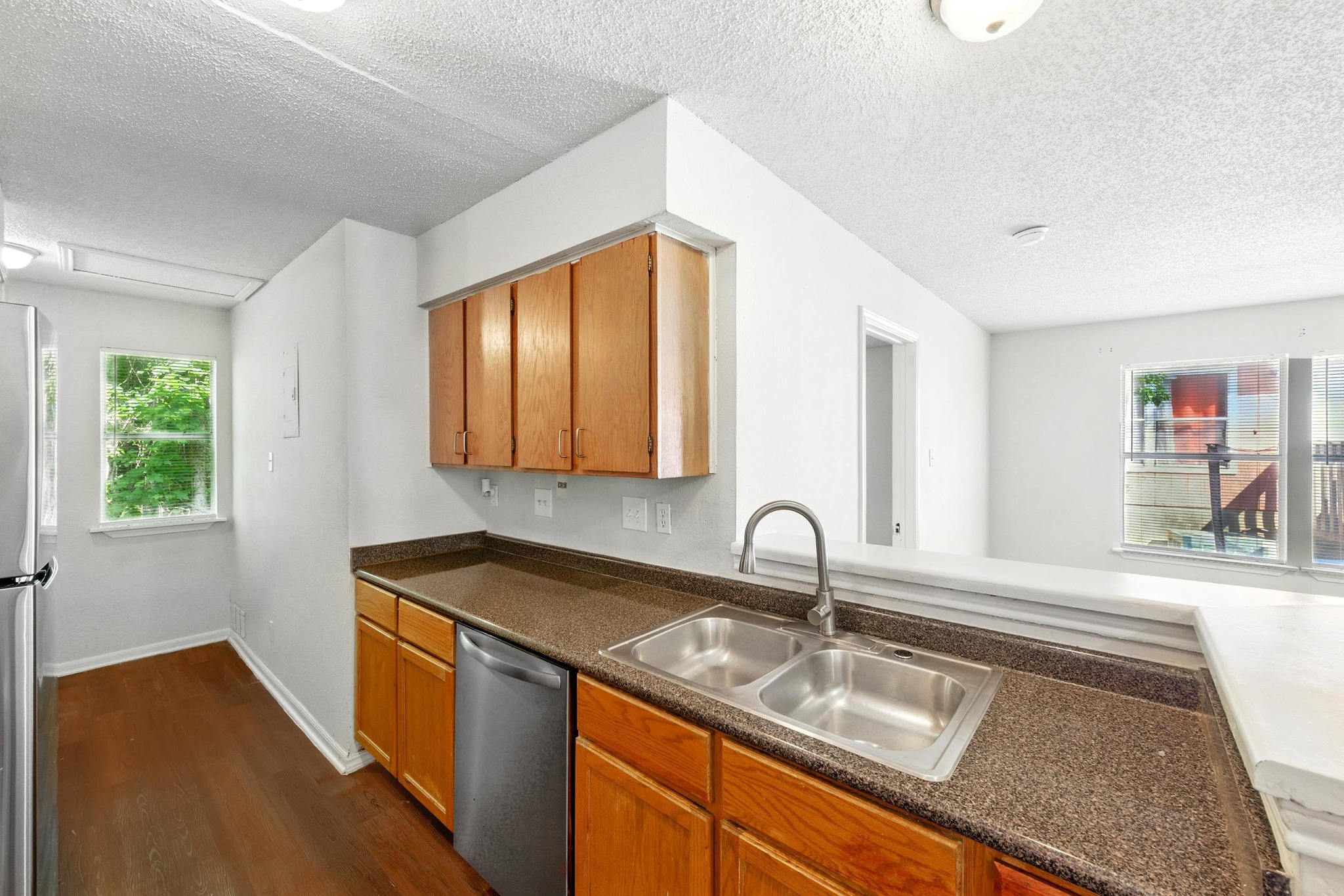 5707 Spring Meadow Road Austin, TX 78744 - Photo 13 of 21 a kitchen with a sink and a window