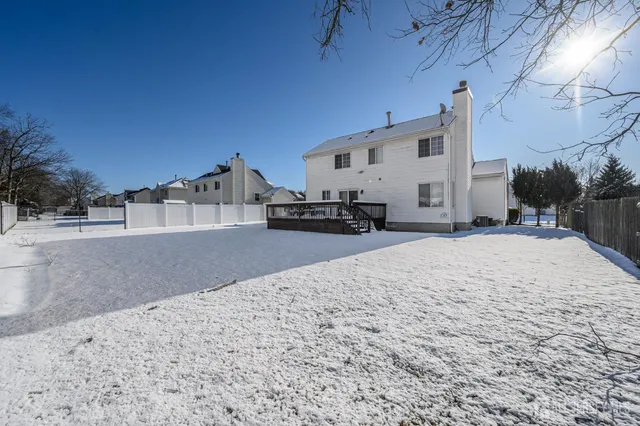 a spacious bathroom with a large mirror