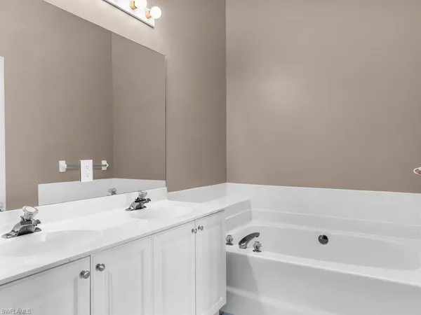 a bathroom with a sink and a bathtub