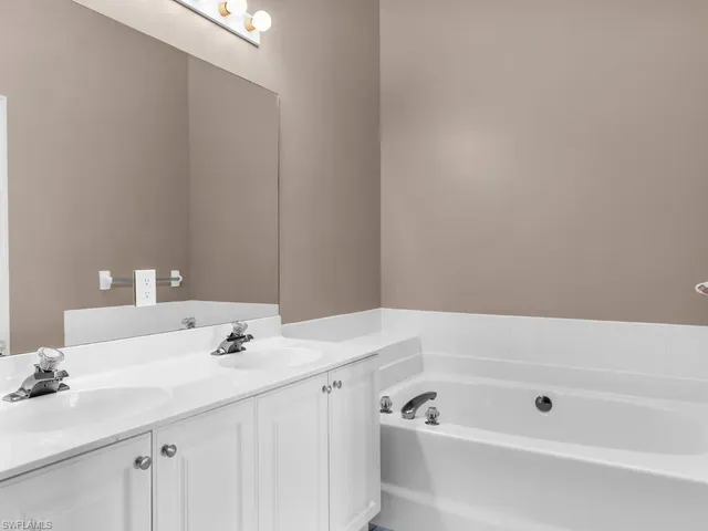 a bathroom with a sink and a bathtub