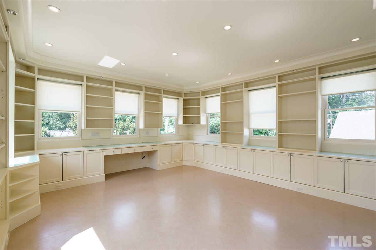 931 Vance Street Raleigh, NC 27608 - Photo 18 of 25 a view of an empty room with a window