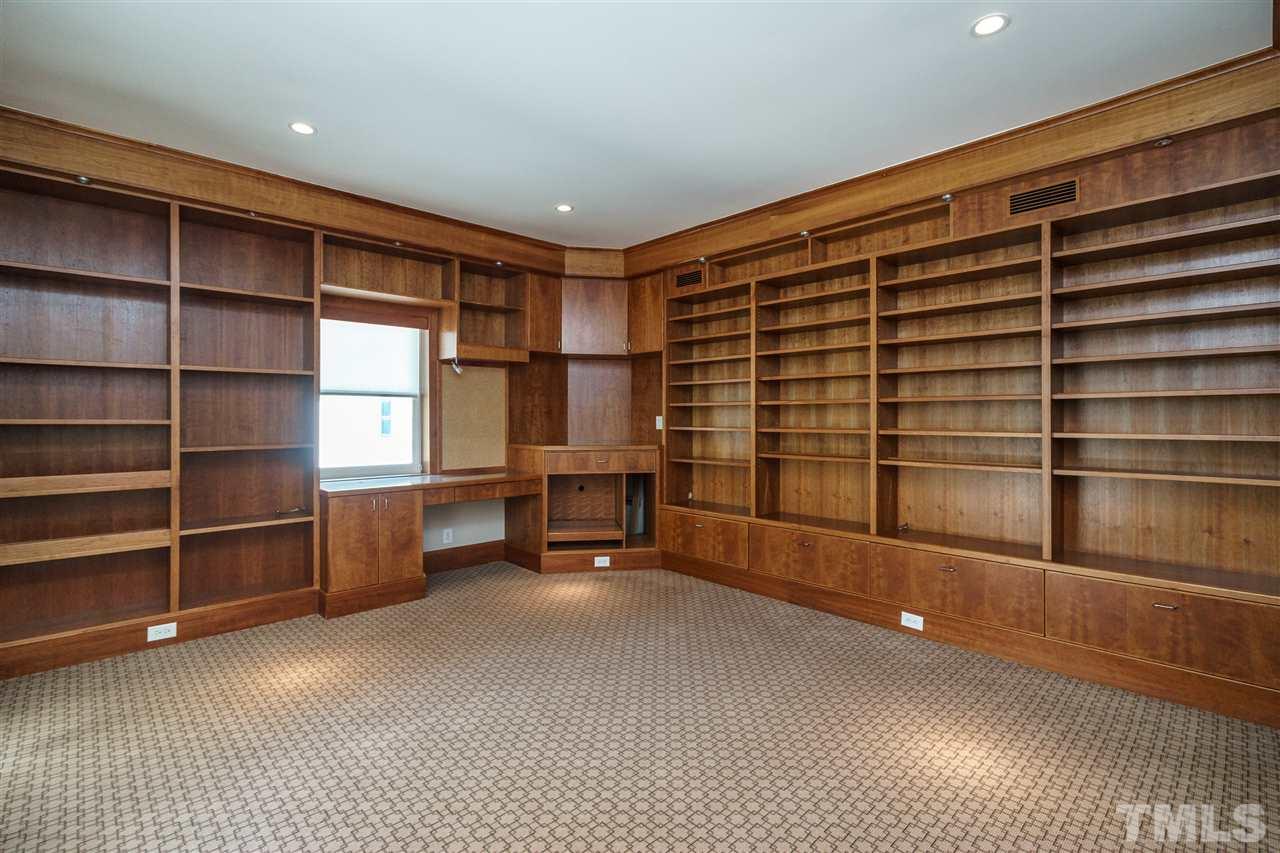 931 Vance Street Raleigh, NC 27608 - Photo 19 of 25 a view of an empty room with a empty shelves