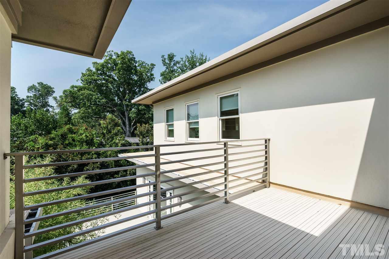 931 Vance Street Raleigh, NC 27608 - Photo 21 of 25 a view of a house with a deck