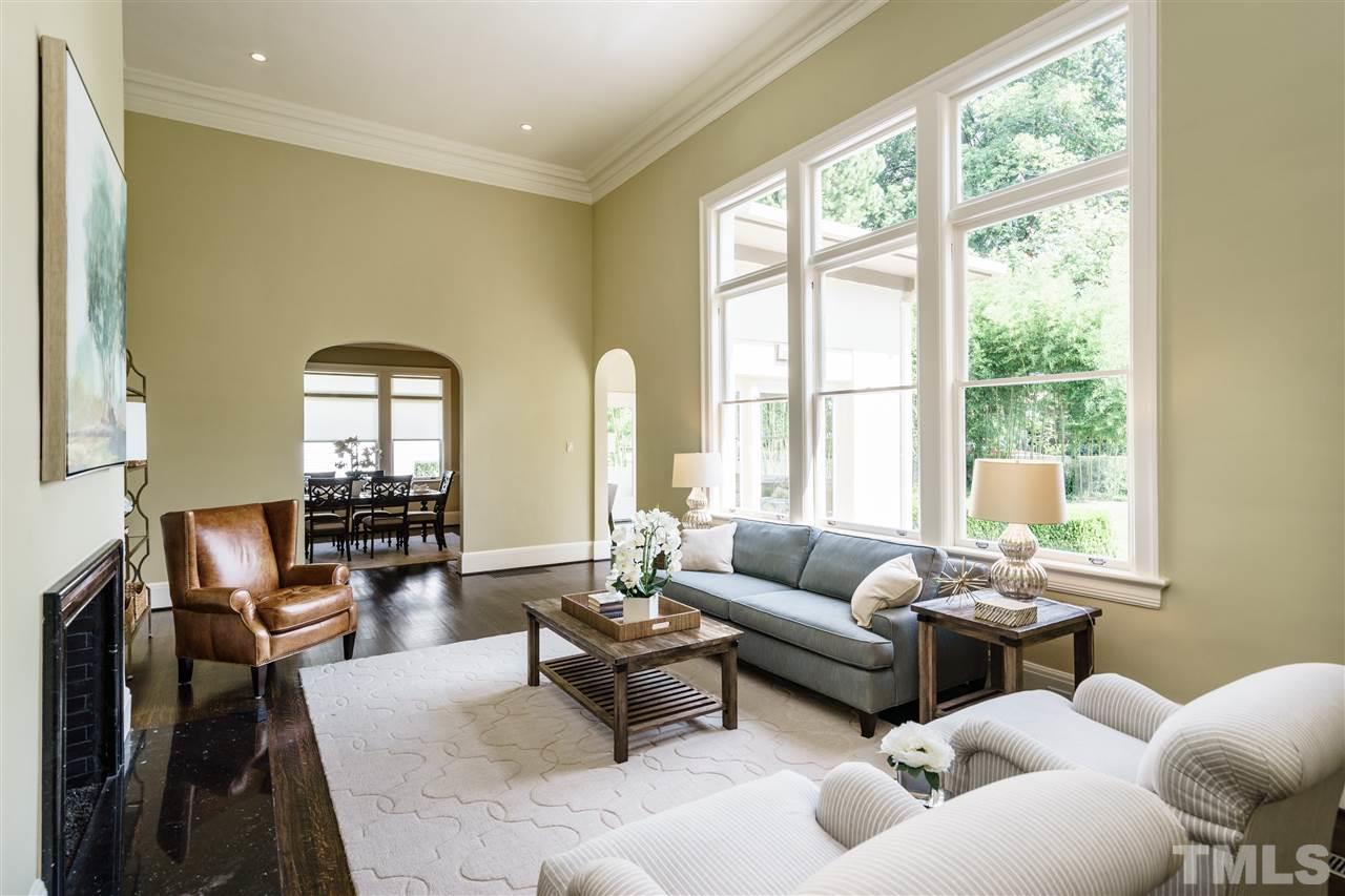 931 Vance Street Raleigh, NC 27608 - Photo 5 of 25 a living room with furniture and a large window