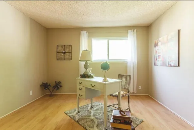 a room with a table and chairs