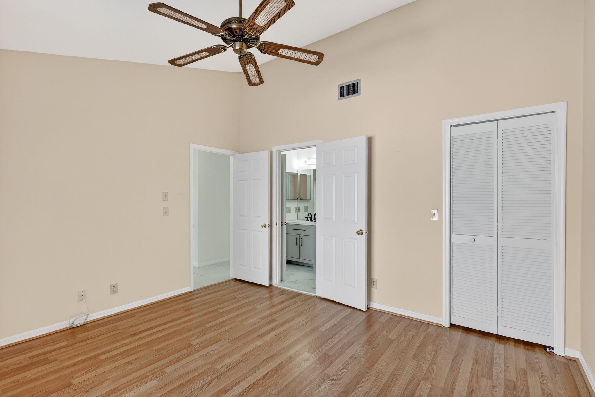 6184 Southeast Georgetown Place Hobe Sound, FL 33455 - Photo 17 of 29 a view of empty room with wooden floor