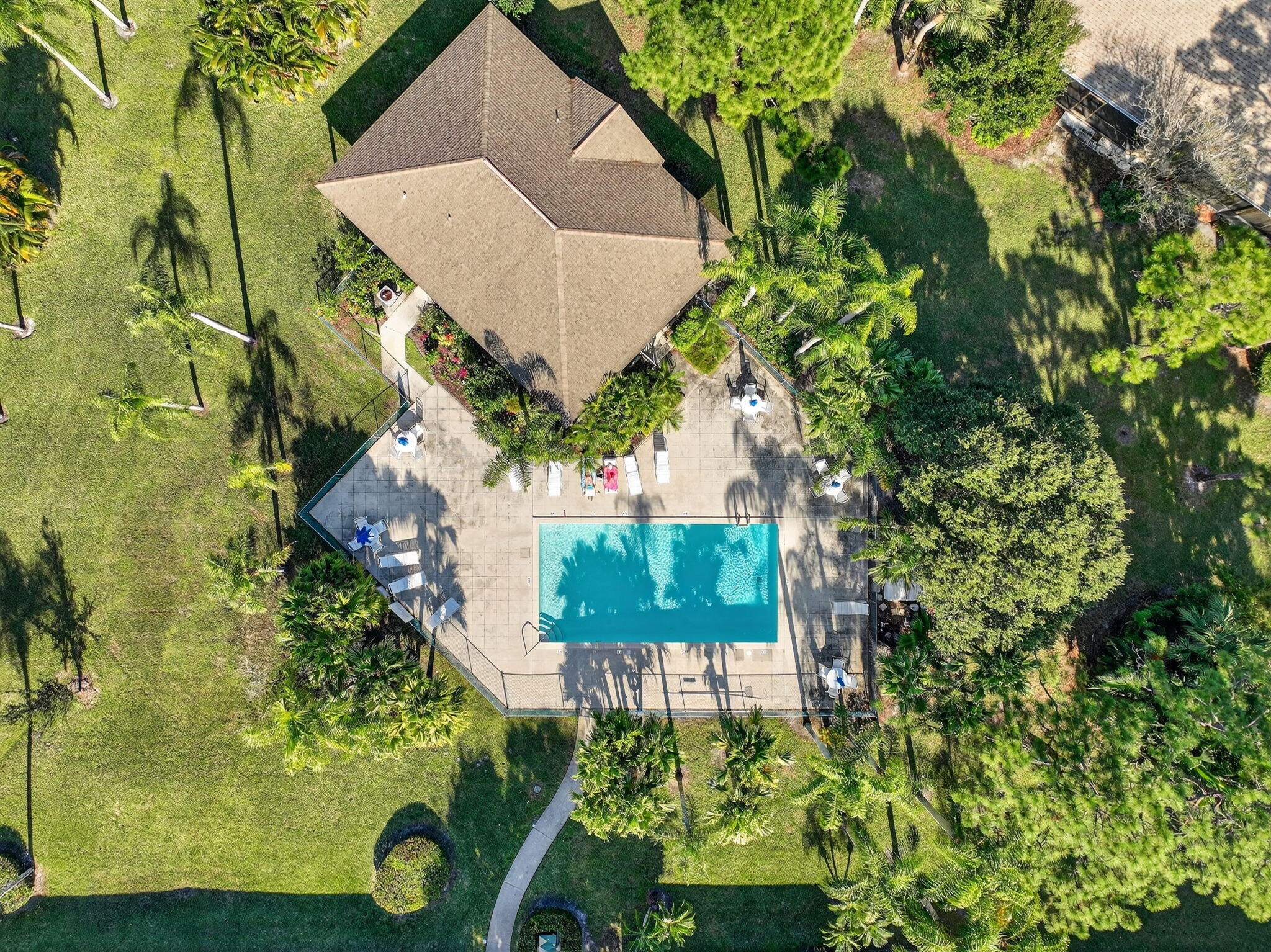 6184 Southeast Georgetown Place Hobe Sound, FL 33455 - Photo 23 of 29 an aerial view of a house with a yard and garden