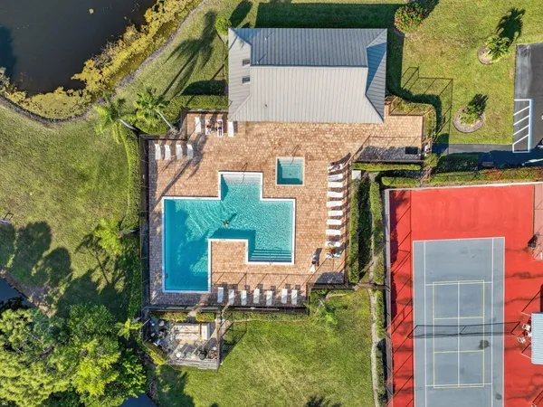 an aerial view of a house with a garden