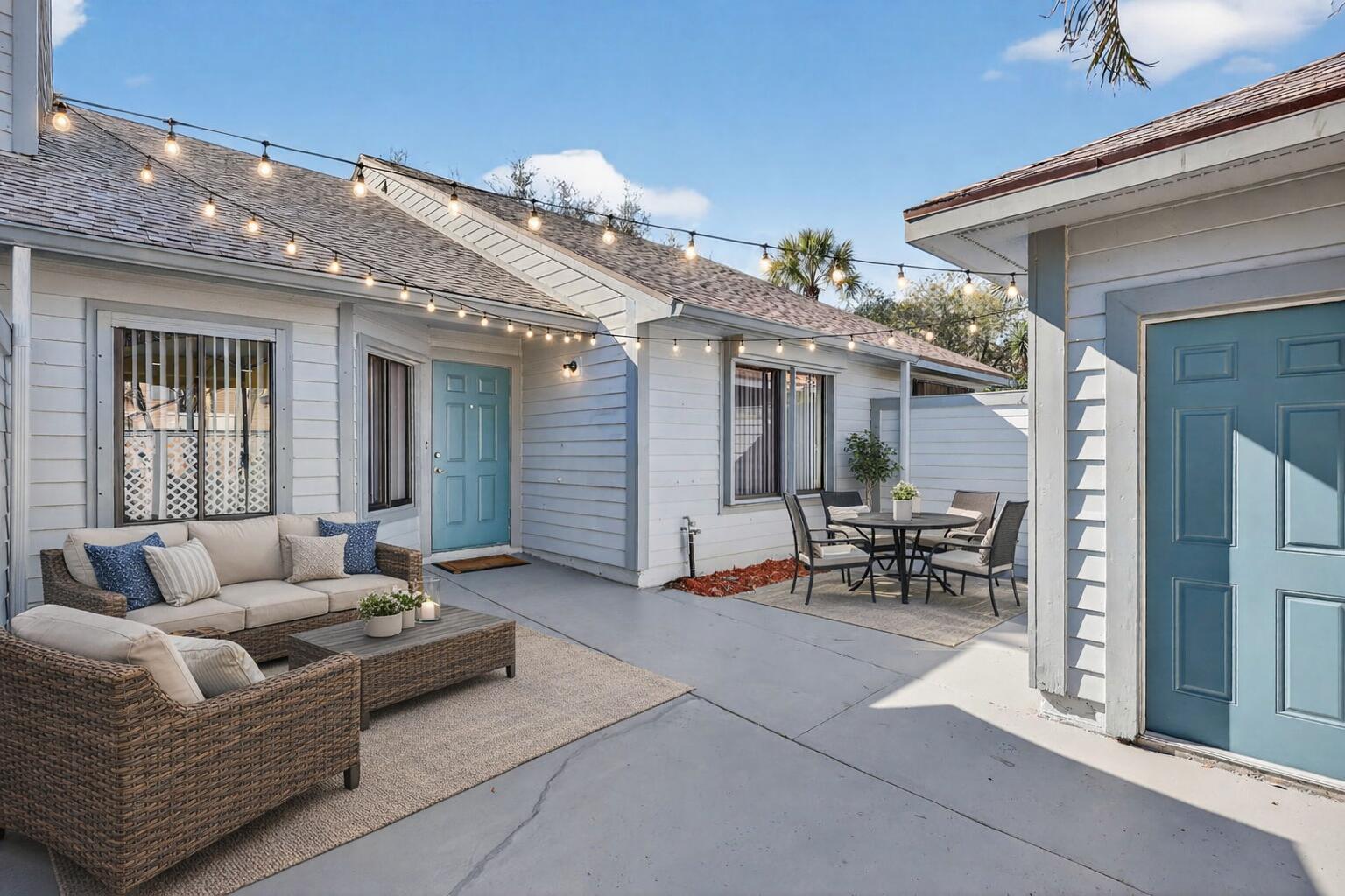 6184 Southeast Georgetown Place Hobe Sound, FL 33455 - Photo 3 of 29 a view of living room filled with furniture and a potted plant