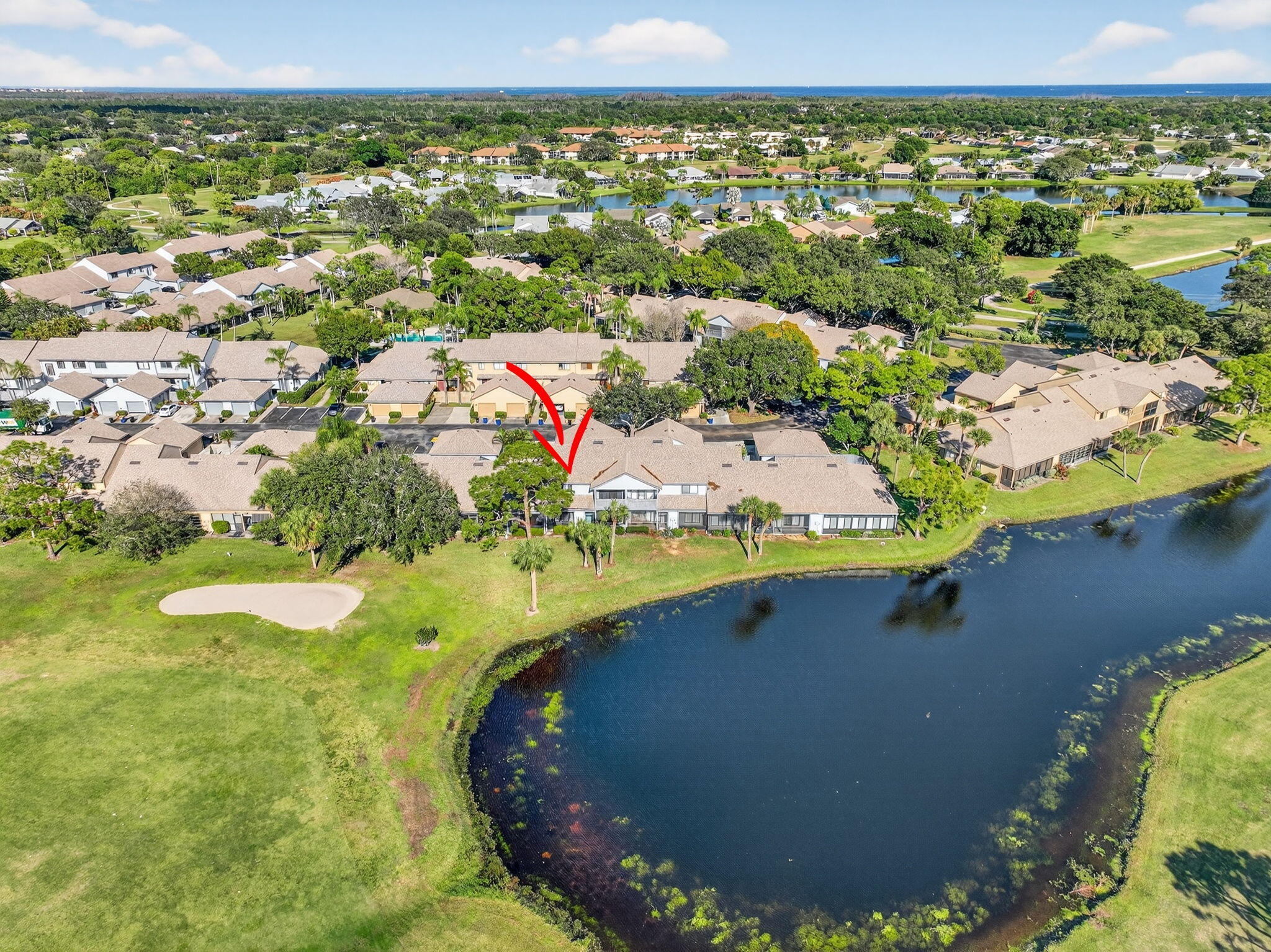 6184 Southeast Georgetown Place Hobe Sound, FL 33455 - Photo 3 of 29 a view of a swimming pool with a yard