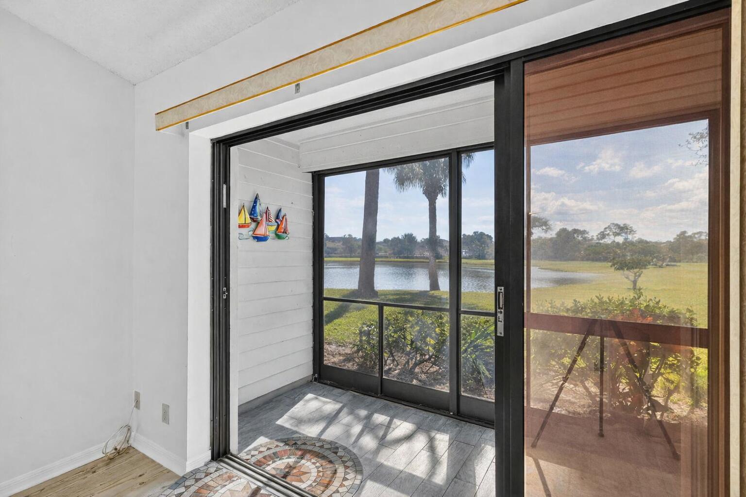 6184 Southeast Georgetown Place Hobe Sound, FL 33455 - Photo 5 of 29 a view of an entryway