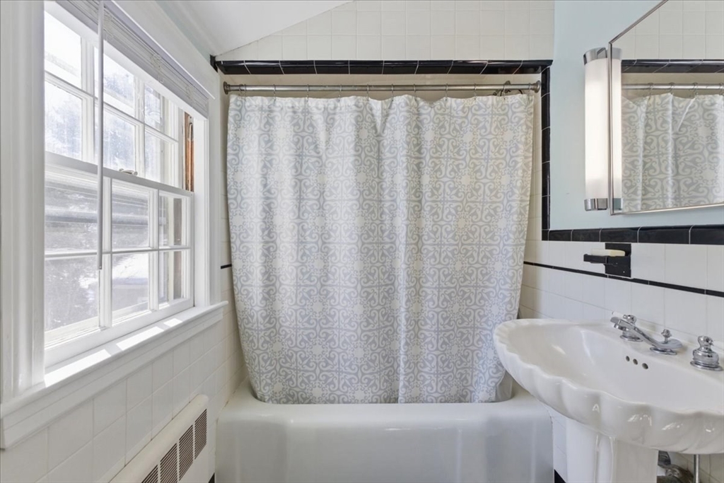 46 Park Street Dedham, MA 02026 - Photo 25 of 35 a bathroom with a bathtub and a sink