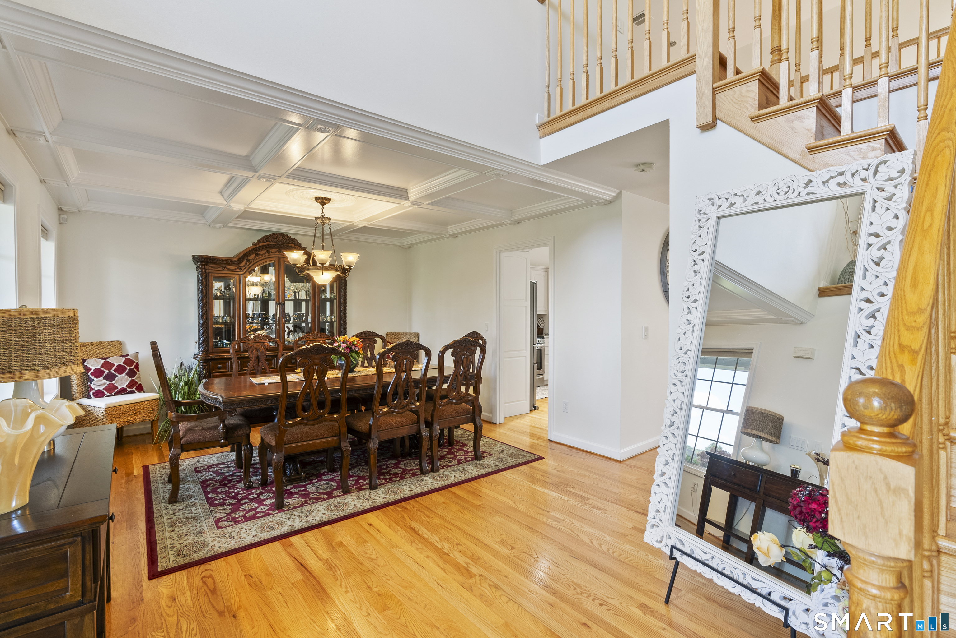 44 Farmstead Lane Suffield, CT 06078 - Photo 6 of 39 a view of a dining room with furniture one side kitchen view and wooden floor