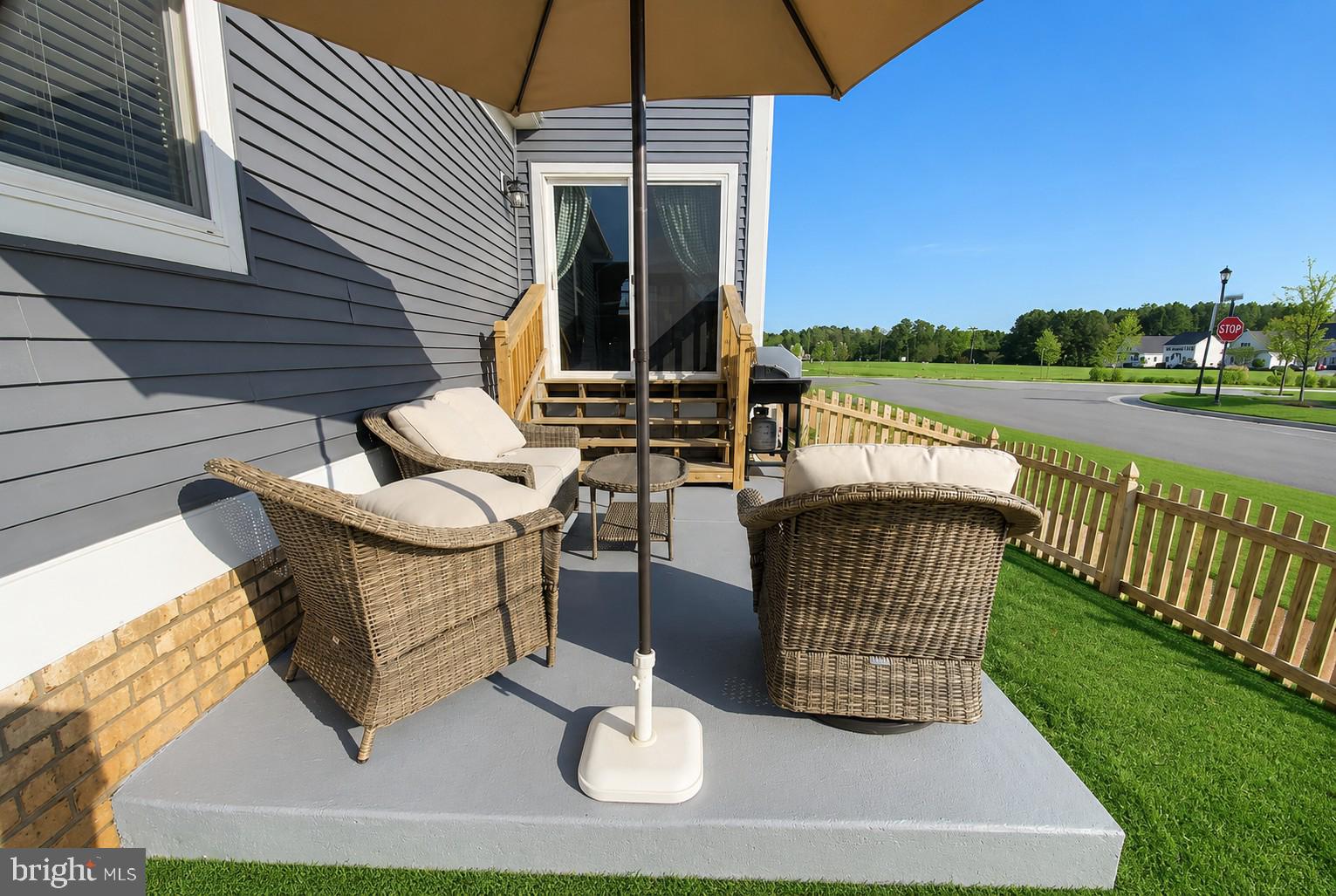 17854 Meriwether Lewis Street Ruther Glen, VA 22546 - Photo 6 of 35 a view of balcony with wooden floor and outdoor seating