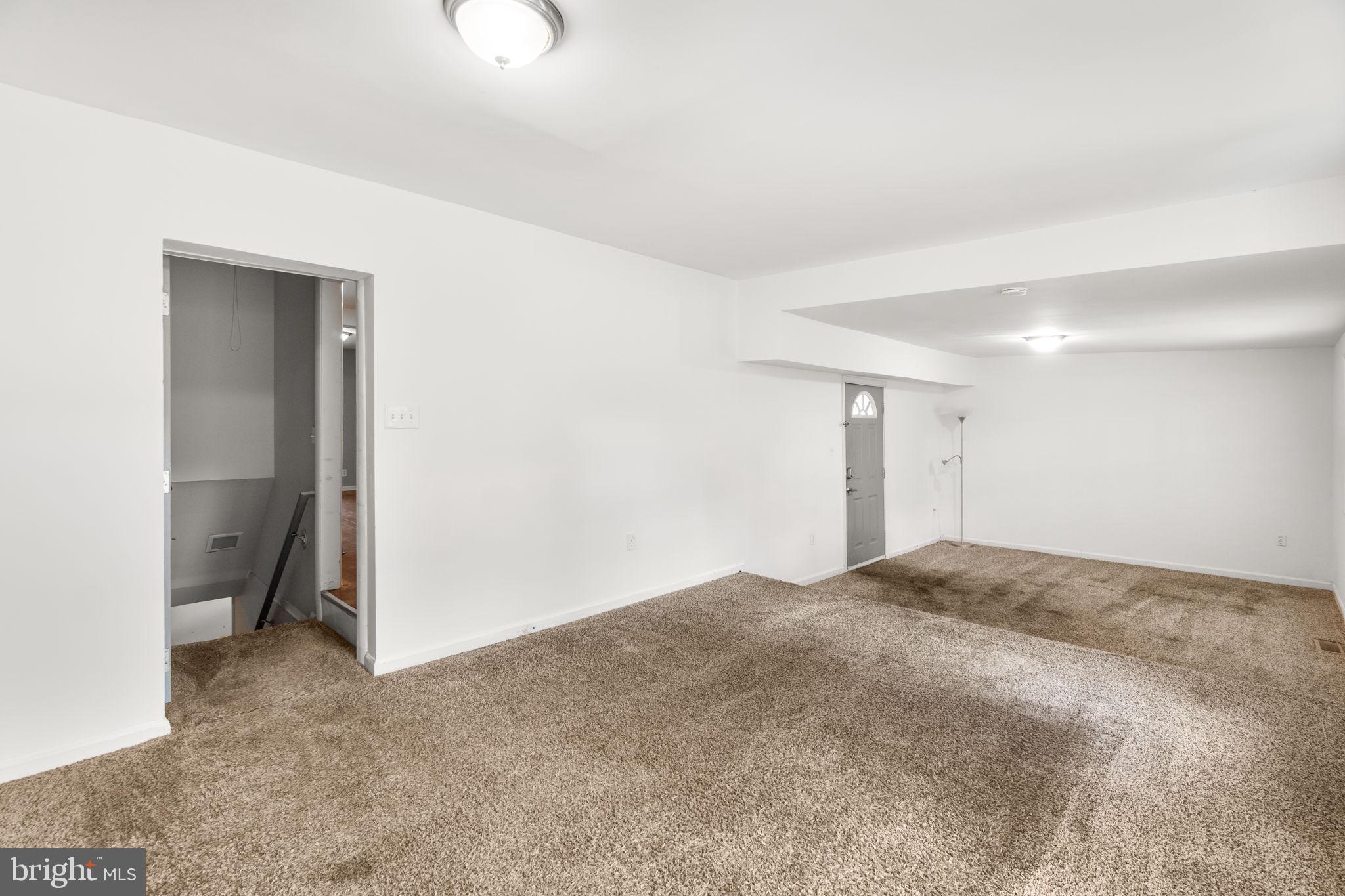 215 Cheddington Road Linthicum Heights, MD 21090 - Photo 14 of 41 a view of an empty room and closet area