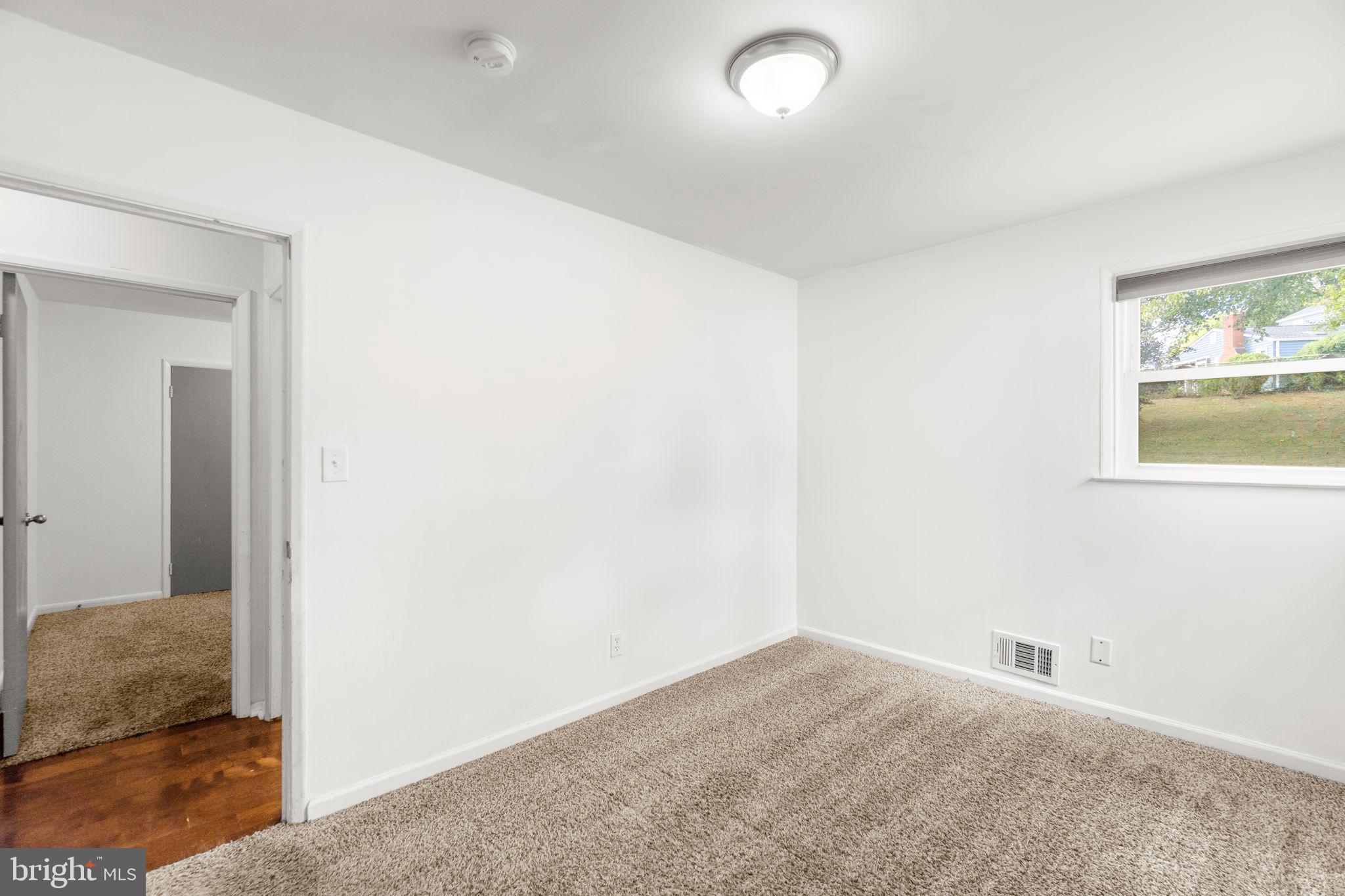215 Cheddington Road Linthicum Heights, MD 21090 - Photo 19 of 41 a view of an empty room
