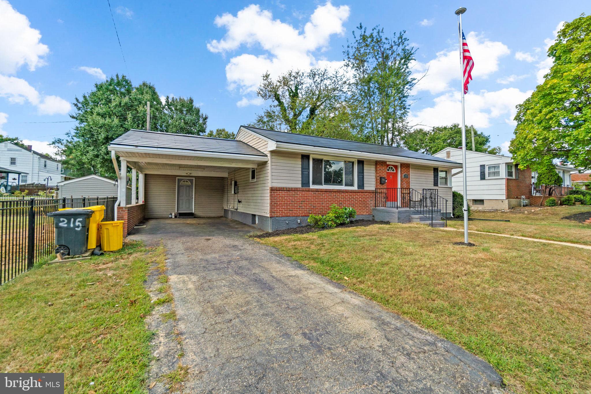 215 Cheddington Road Linthicum Heights, MD 21090 - Photo 2 of 41 a front view of a house with garden