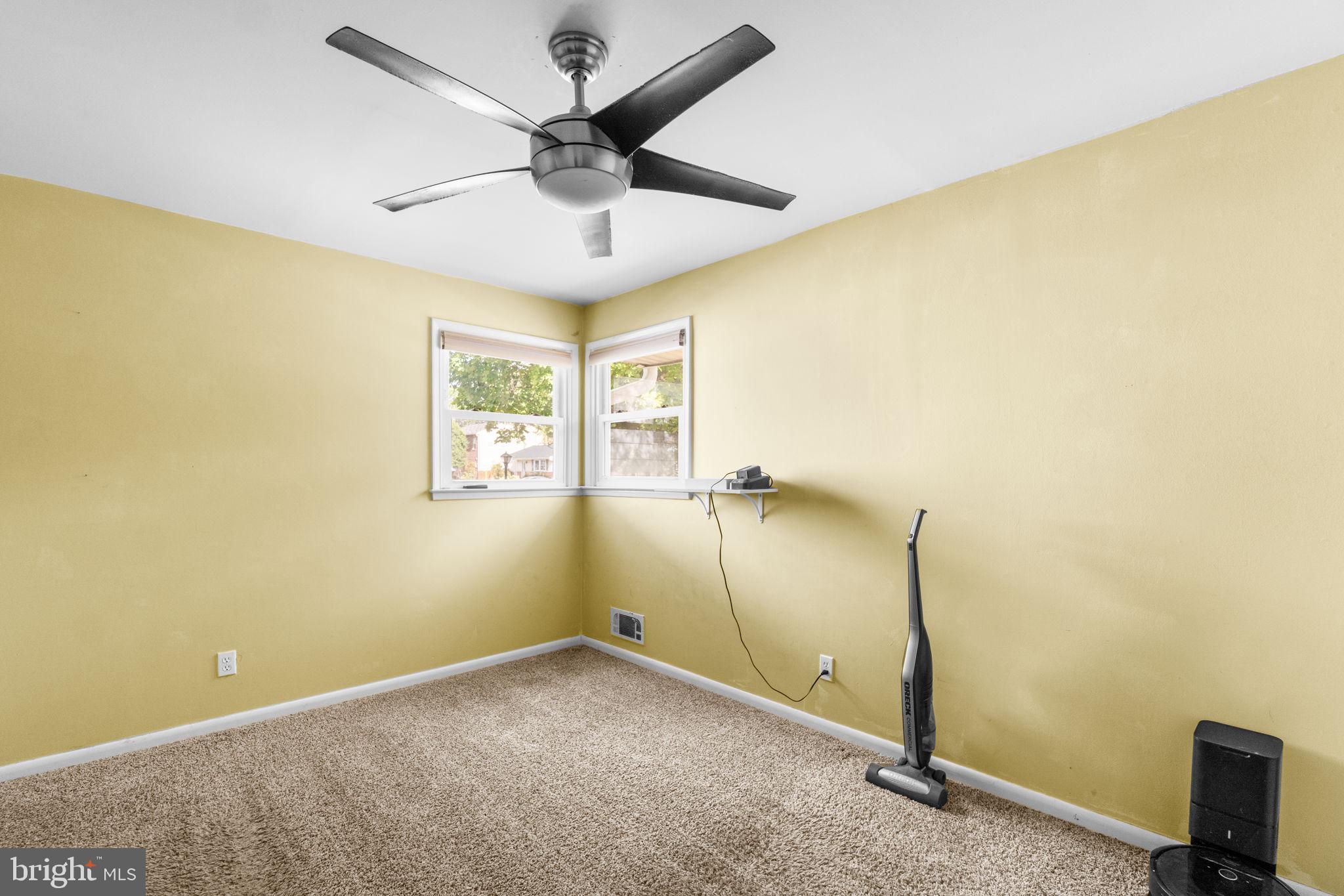 215 Cheddington Road Linthicum Heights, MD 21090 - Photo 22 of 41 a view of a big room with windows