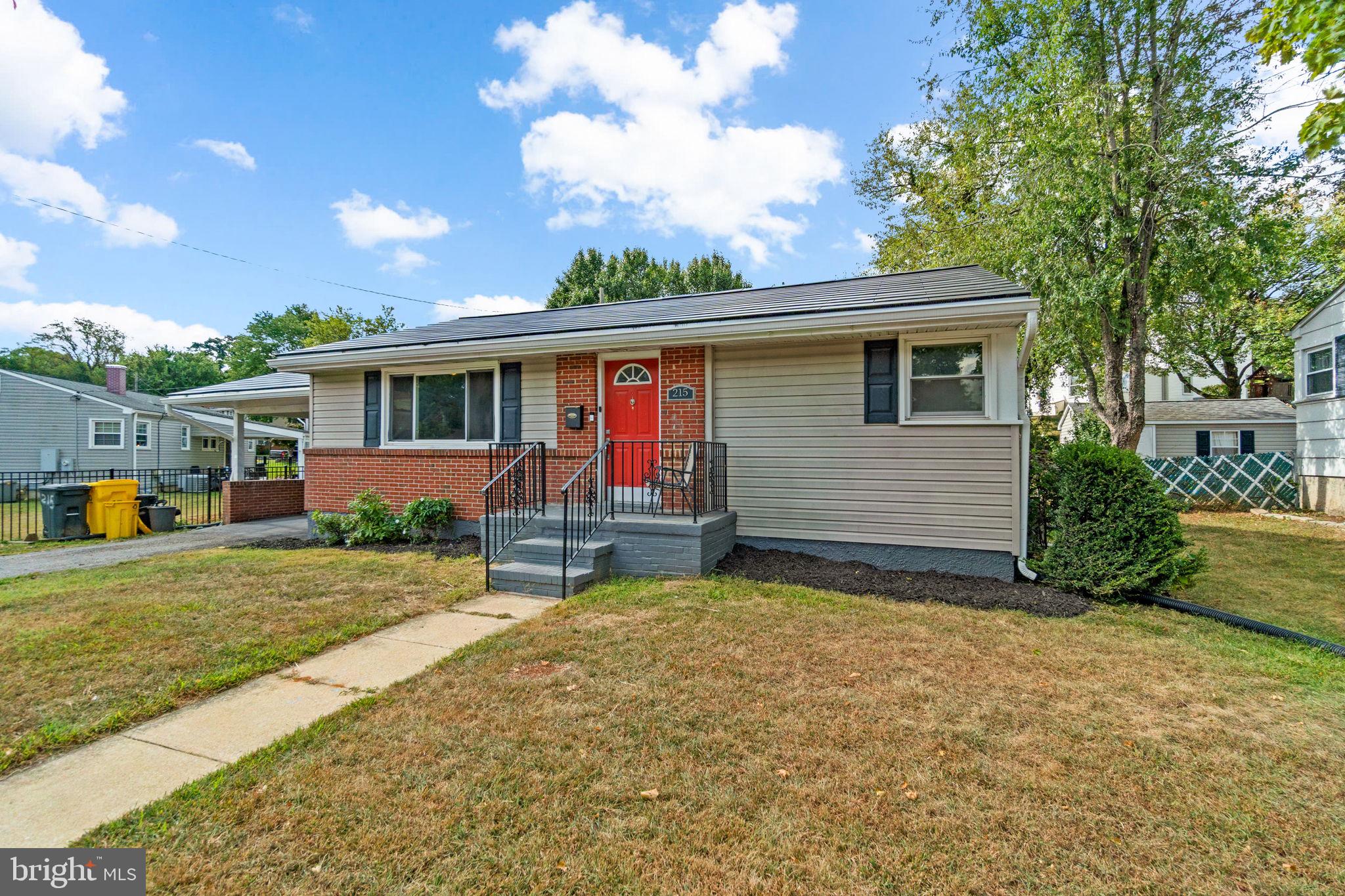 215 Cheddington Road Linthicum Heights, MD 21090 - Photo 3 of 41 a view of a house with a yard