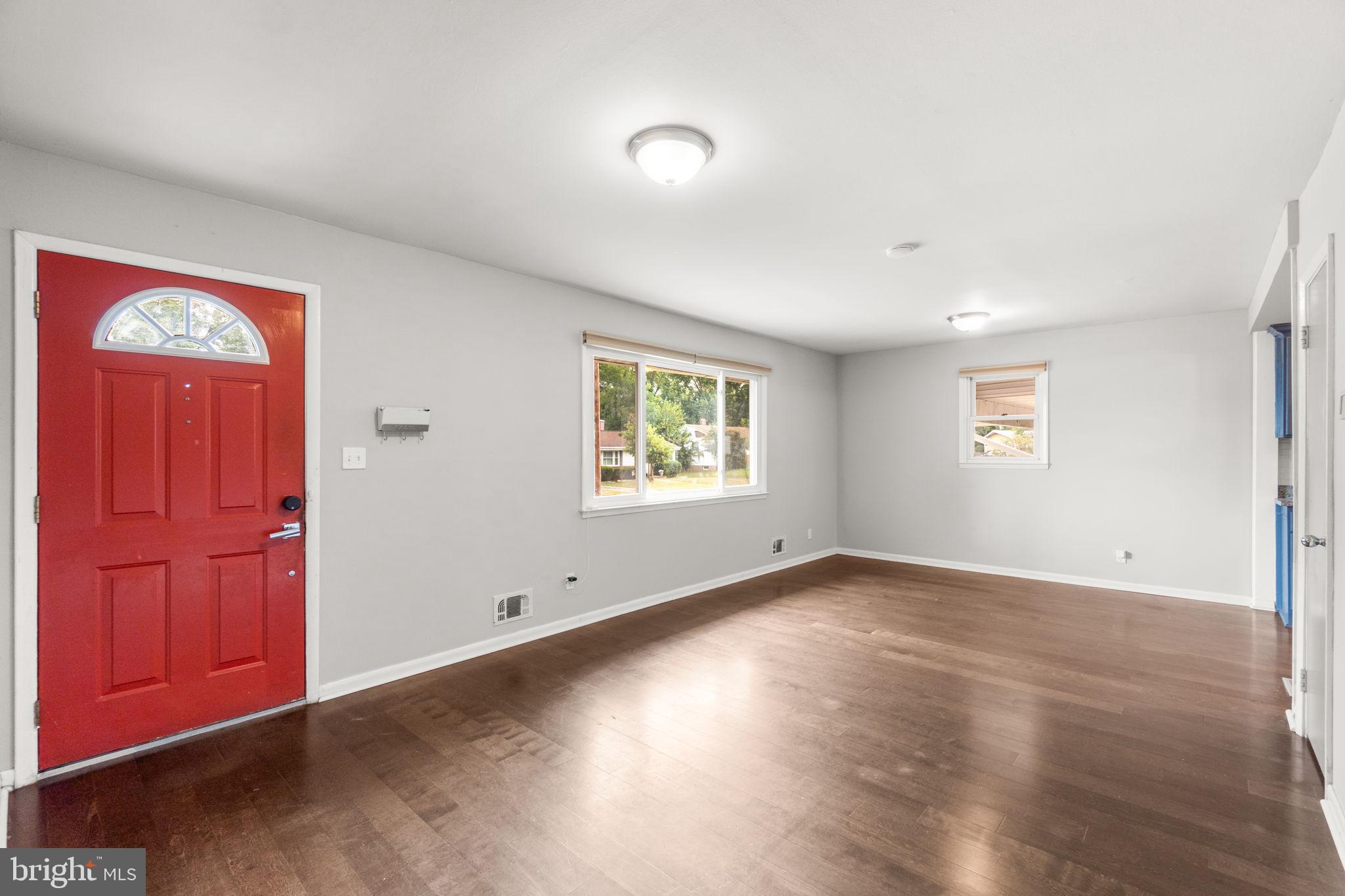 215 Cheddington Road Linthicum Heights, MD 21090 - Photo 5 of 41 an empty room with windows and closet