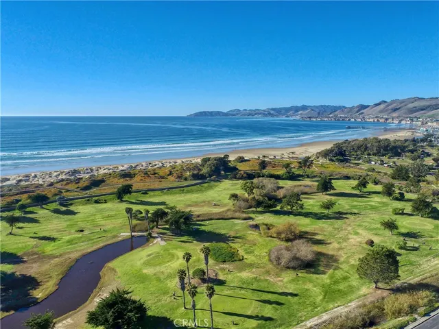 a view of an ocean and a yard
