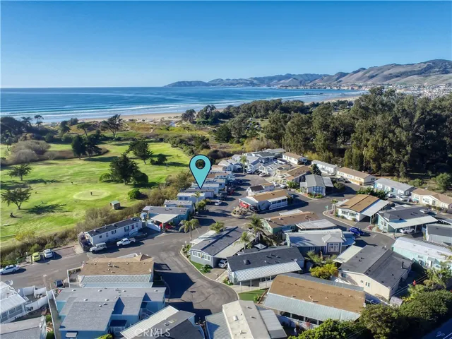 a view of a city with mountains in the background