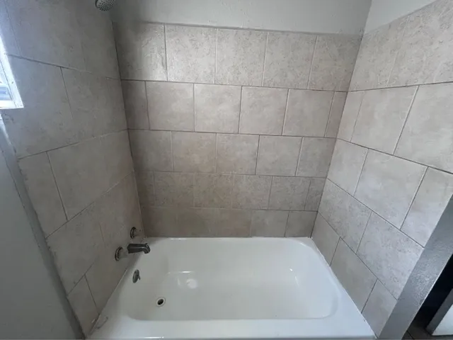 a bathroom with a bathtub