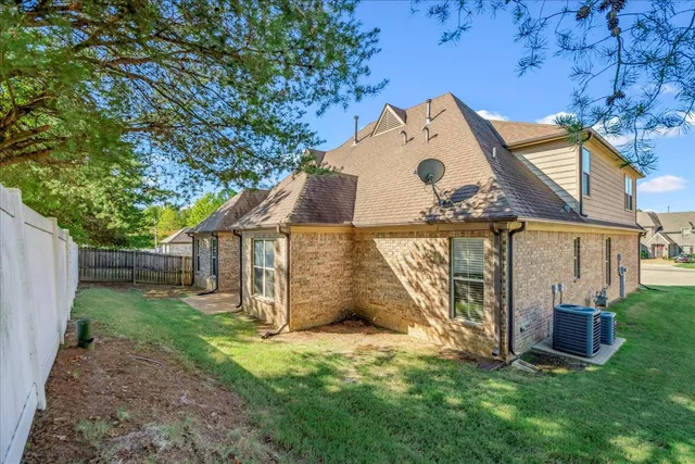 front view of a house with a big yard