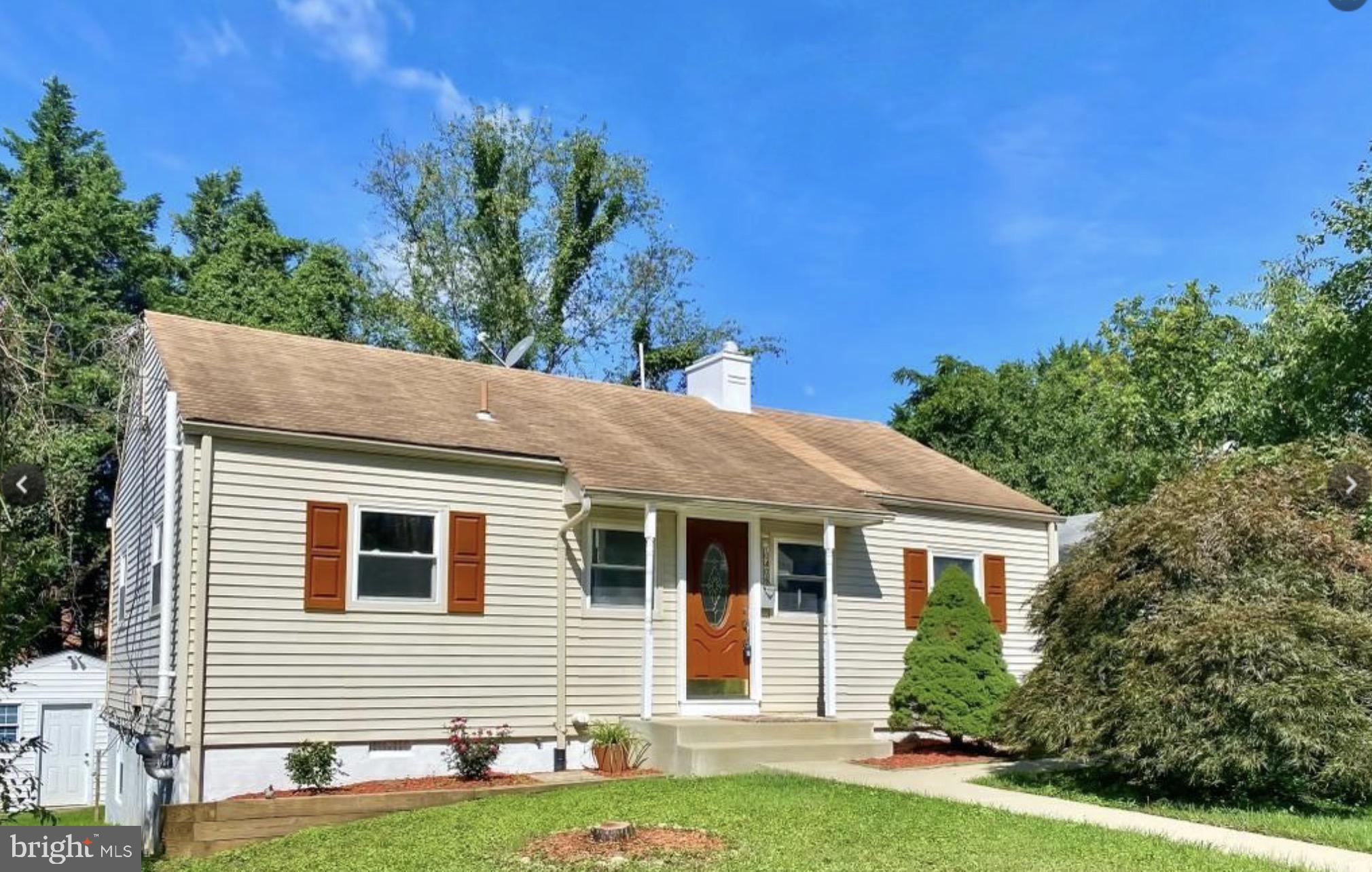 Charming home with inviting curb appeal.