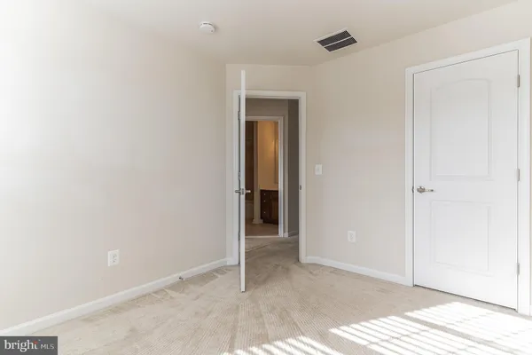 a bathroom with a sink toilet and vanity