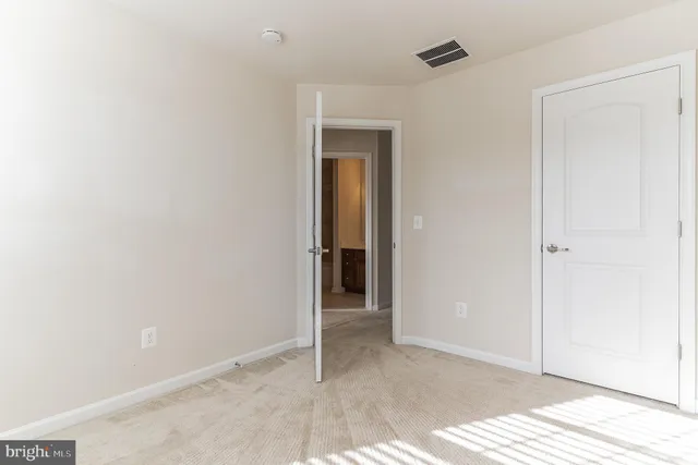 a bathroom with a sink toilet and vanity