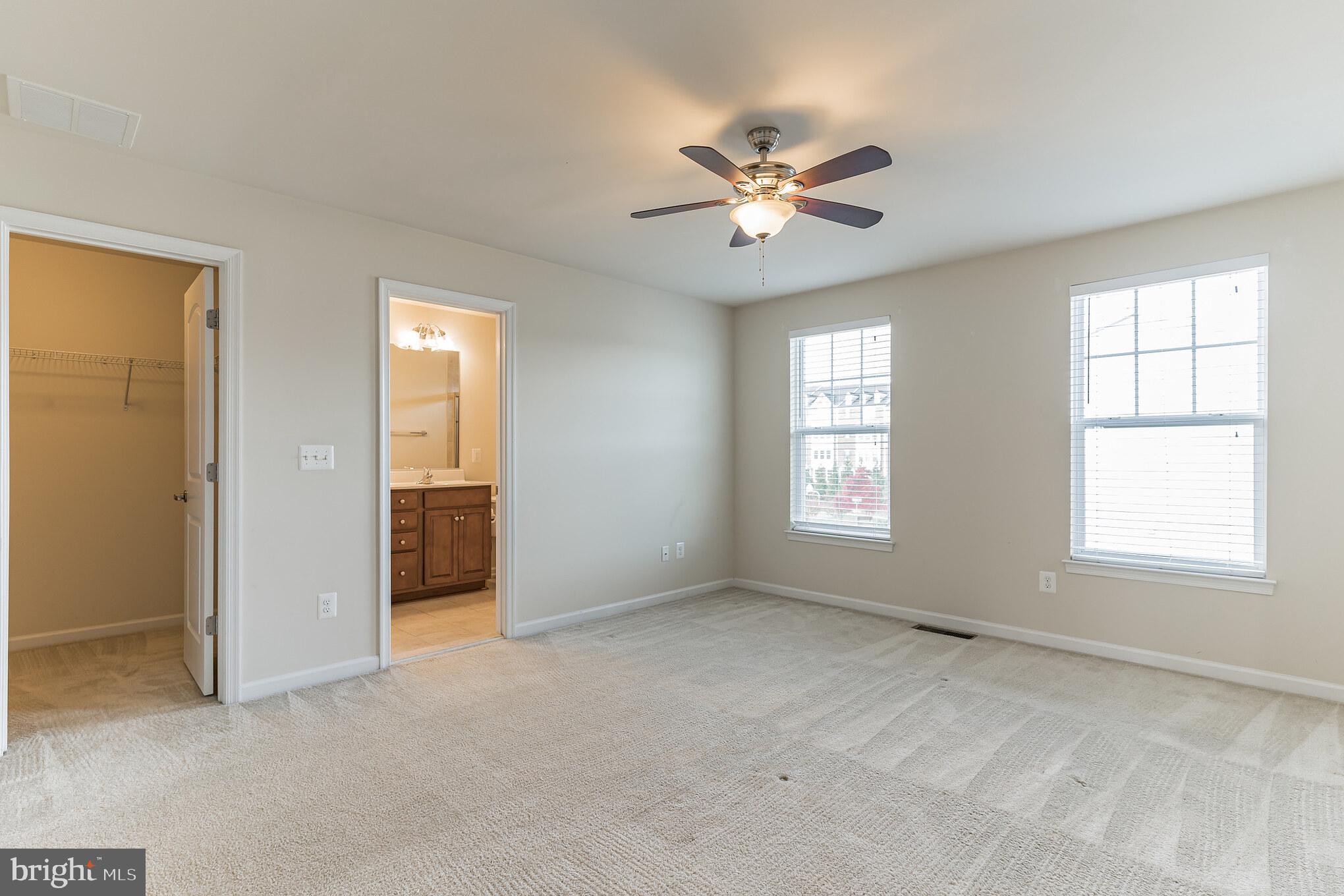25621 Pleasant Valley Road Chantilly, VA 20152 - Photo 15 of 52 a view of an empty room with a window