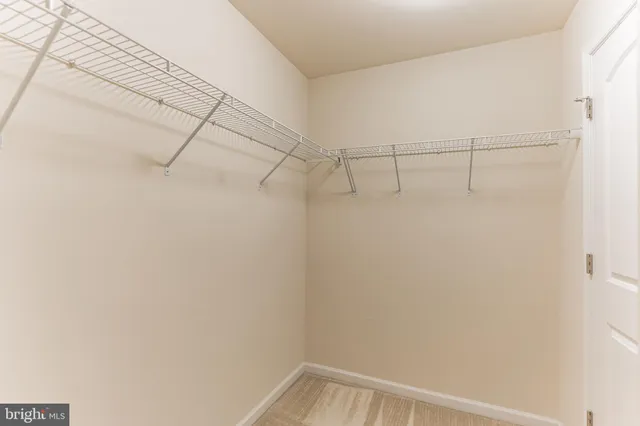 a view of a balcony with wooden floor