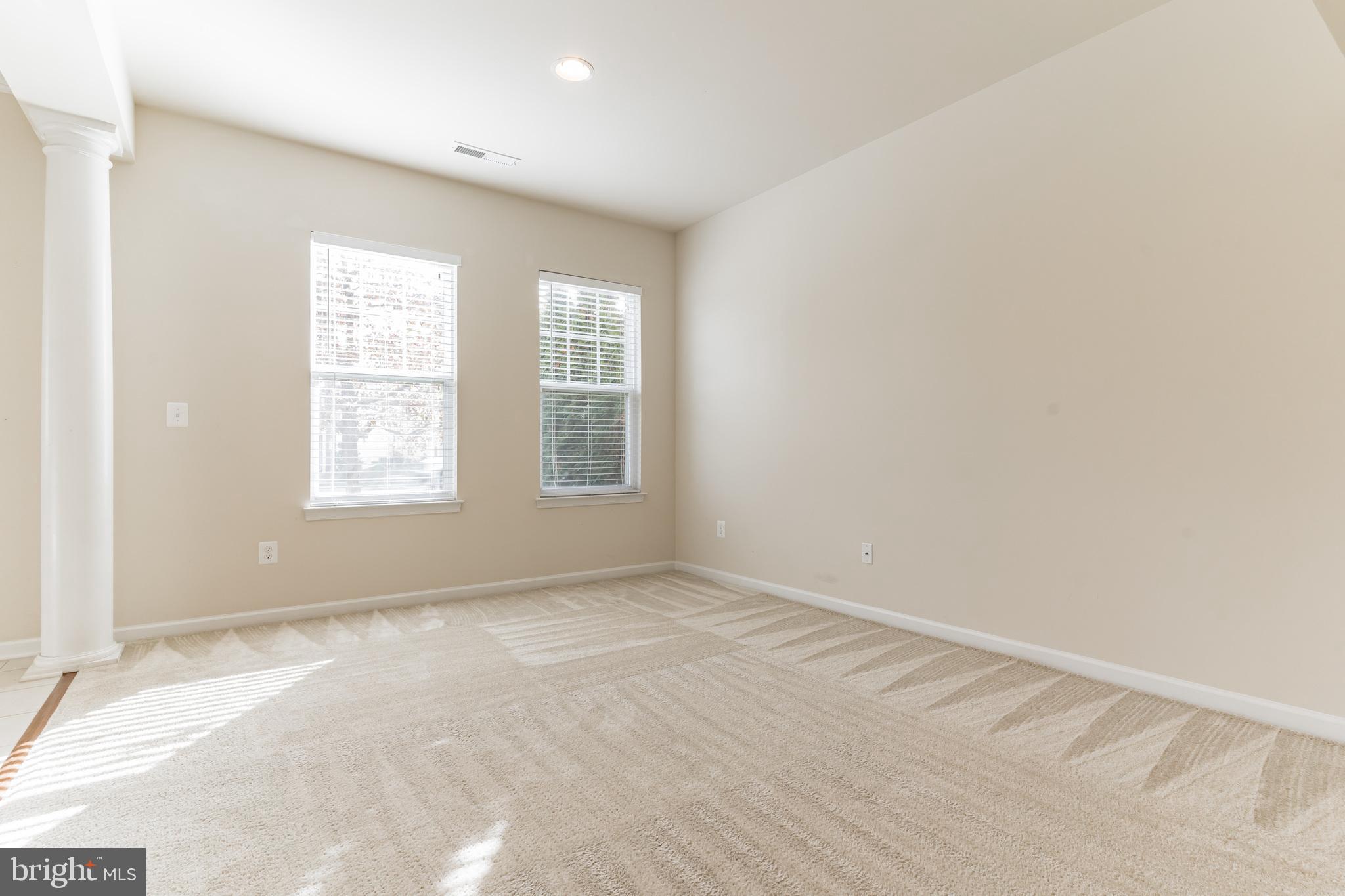 25621 Pleasant Valley Road Chantilly, VA 20152 - Photo 40 of 52 an empty room with windows