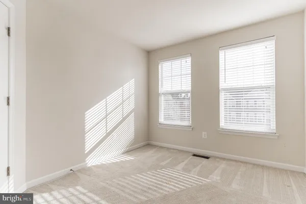wooden floor and a bathroom with a sink