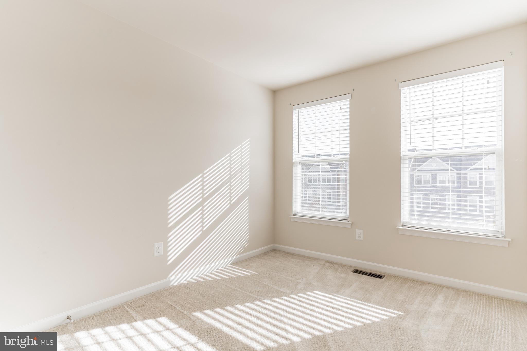 25621 Pleasant Valley Road Chantilly, VA 20152 - Photo 9 of 52 a view of an empty room and a window