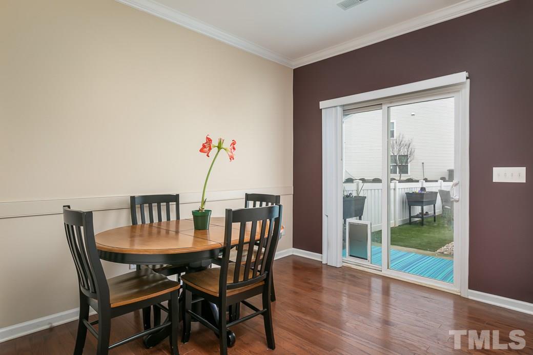 941 Ileagnes Road Raleigh, NC 27603 - Photo 5 of 11 Light filled breakfast area. Perfect for your morning cup of coffee