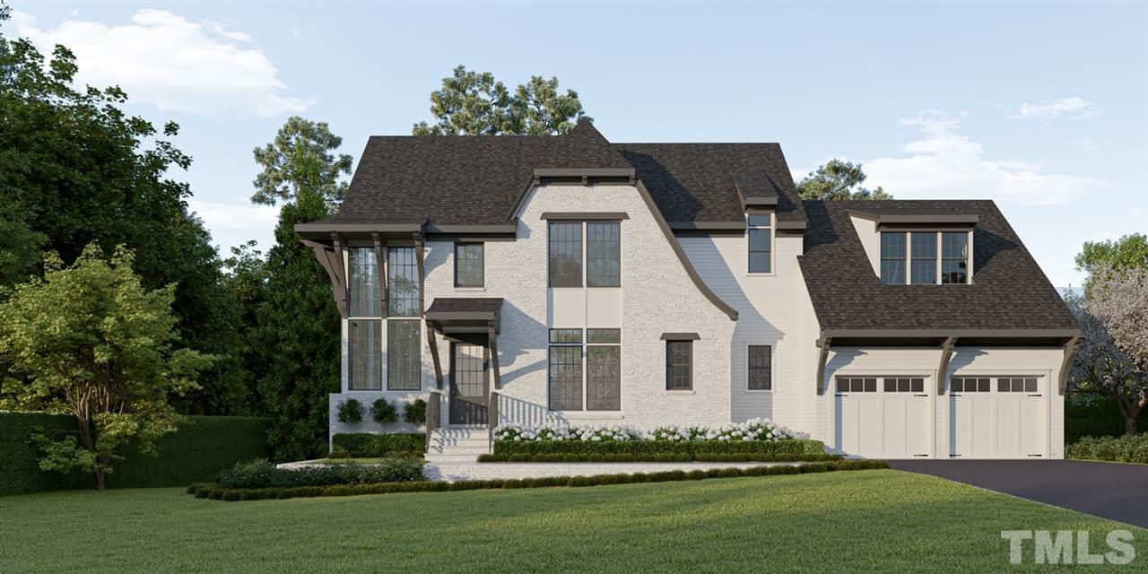 3703 Bellevue Road Raleigh, NC 27609 - Photo 1 of 6 a front view of a house with a garden