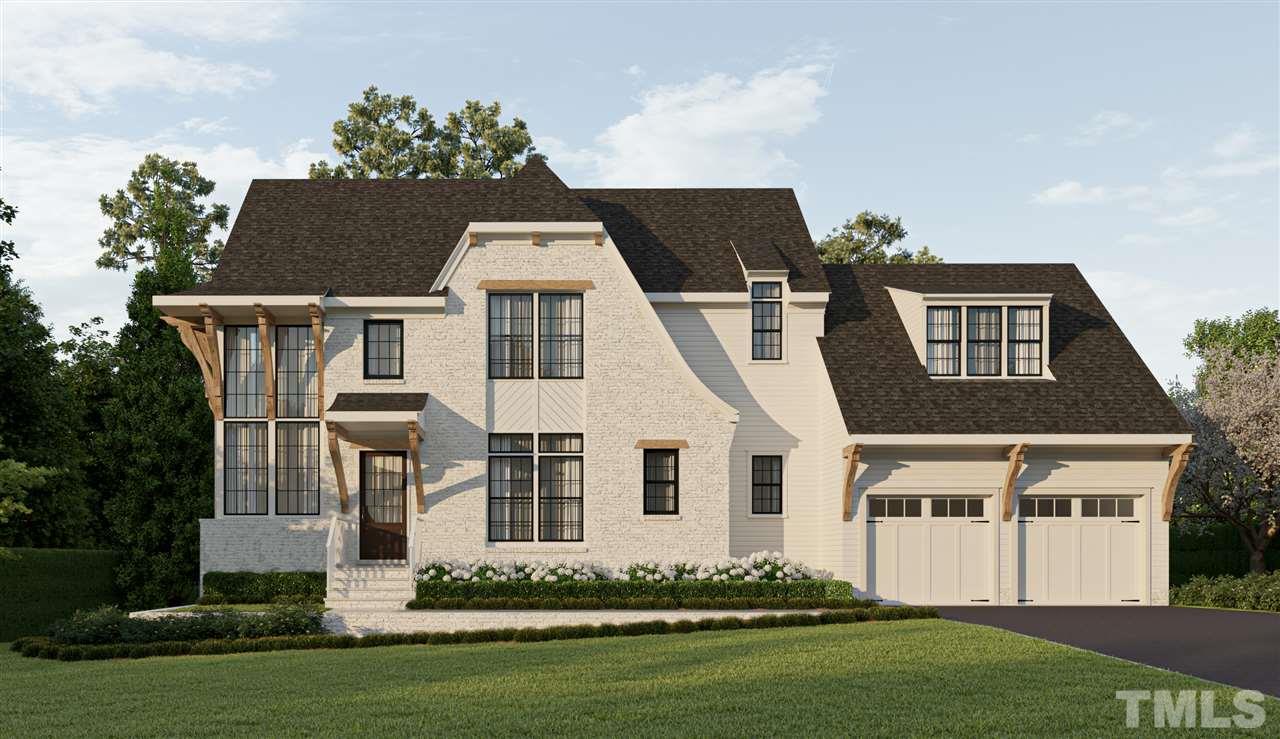 3703 Bellevue Road Raleigh, NC 27609 - Photo 3 of 6 a front view of a house with a yard