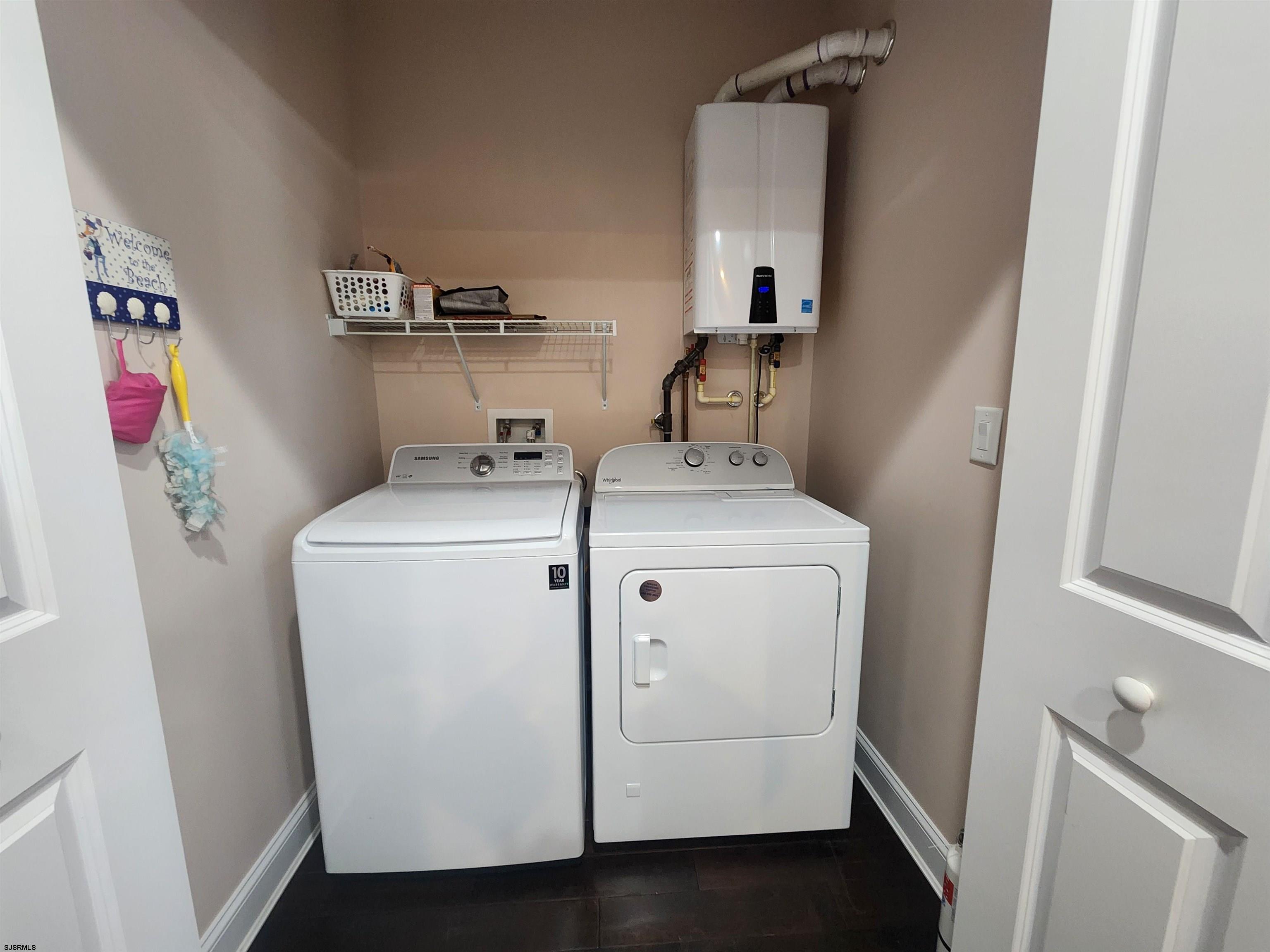 16 North Decatur Avenue, Unit 1 Margate City, NJ 08402 - Photo 12 of 29 a utility room with dryer and washer